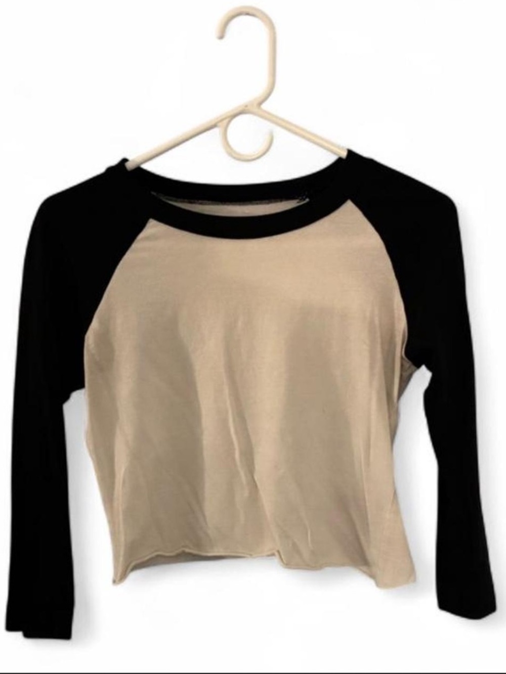Cropped black and cream long sleeve top